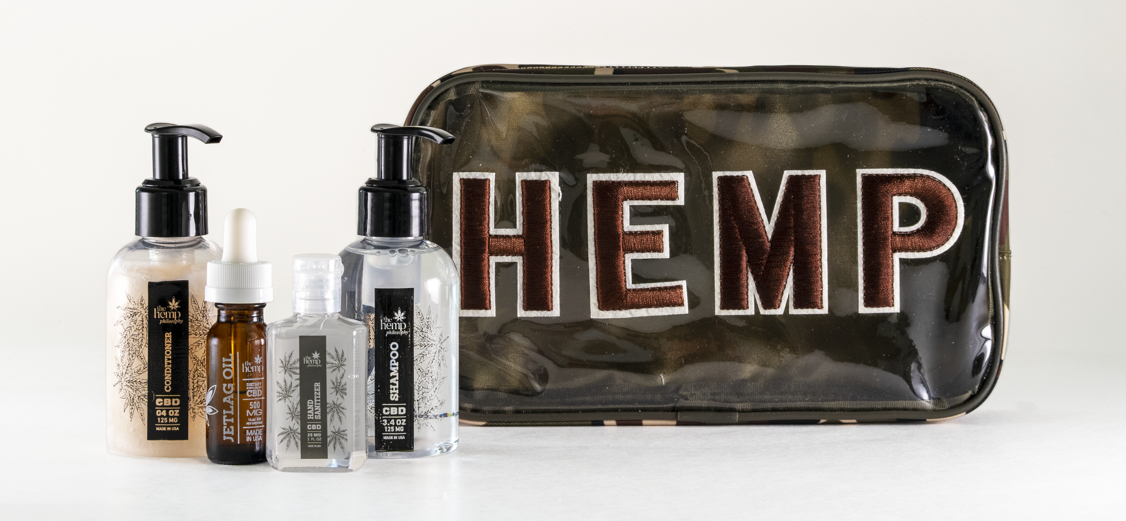 Hemp Travel Pack - Large comes with CBD Shampoo, Conditioner, Jet Lag Oil and Hand Sanitizer